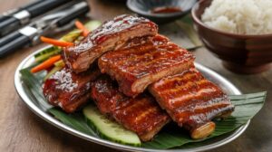 "Spicy Korean BBQ short ribs served with banchan and lettuce wraps" 